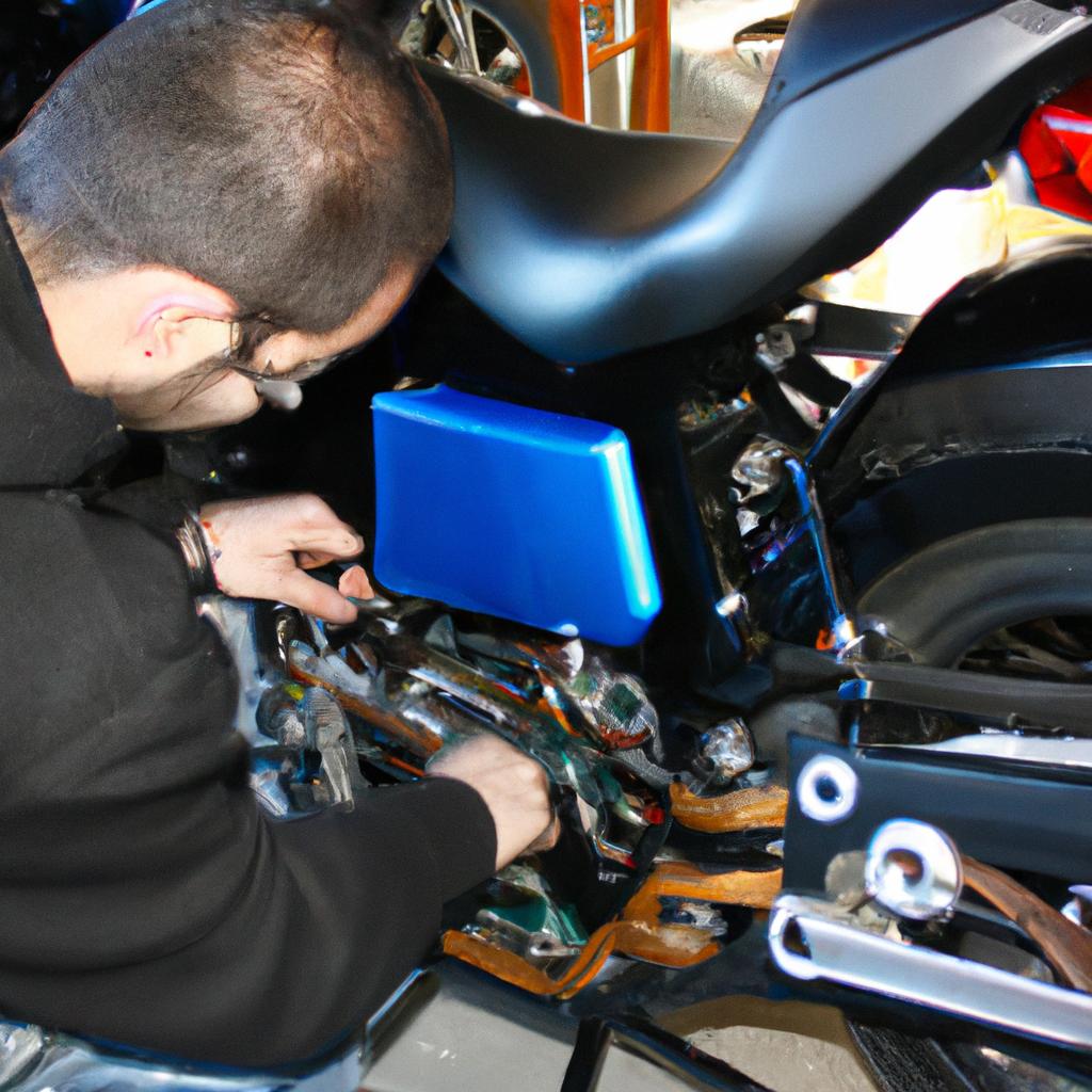 Person working on electric motorcycle