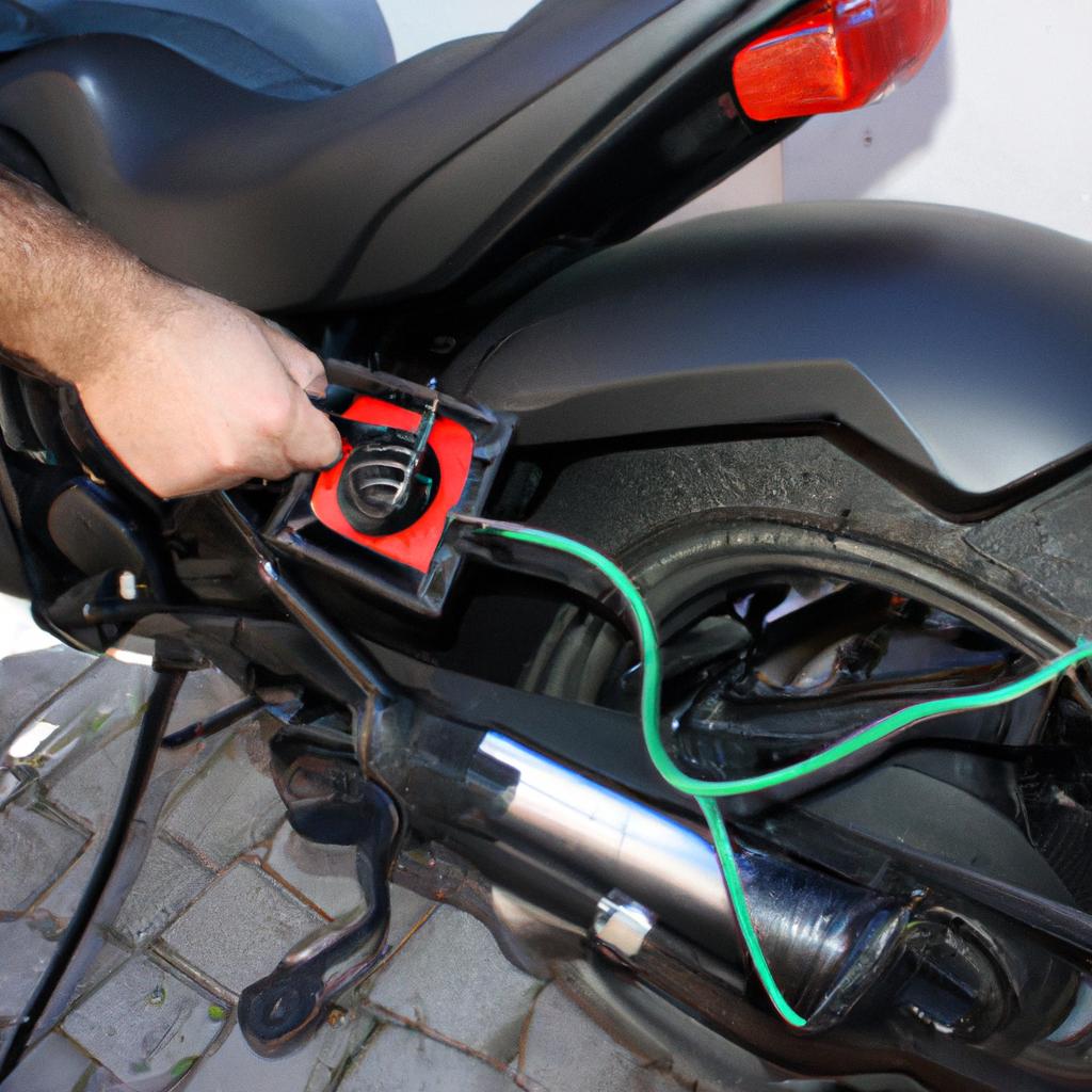 Person plugging in electric motorcycle