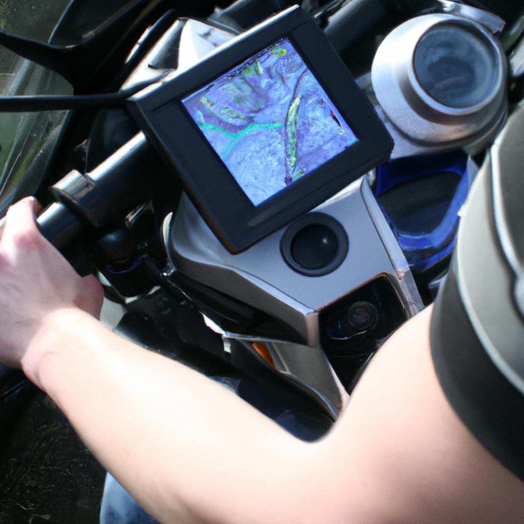 Person using motorcycle navigation system